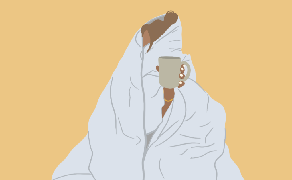 An illustration of a woman huddling under a blanket while holding a mug of tea